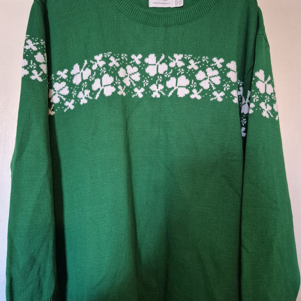 Green Sweater with White Shamrocks. Light weight and soft.